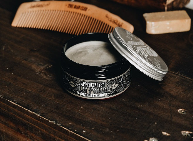 hair putty and comb on a table