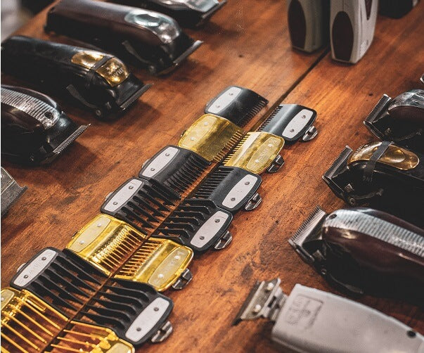 table filled with hair clippers